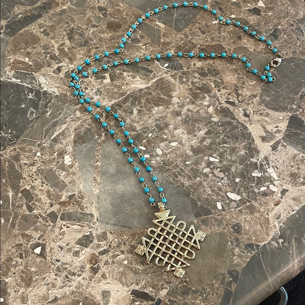 Elegant Gold and Blue Necklace